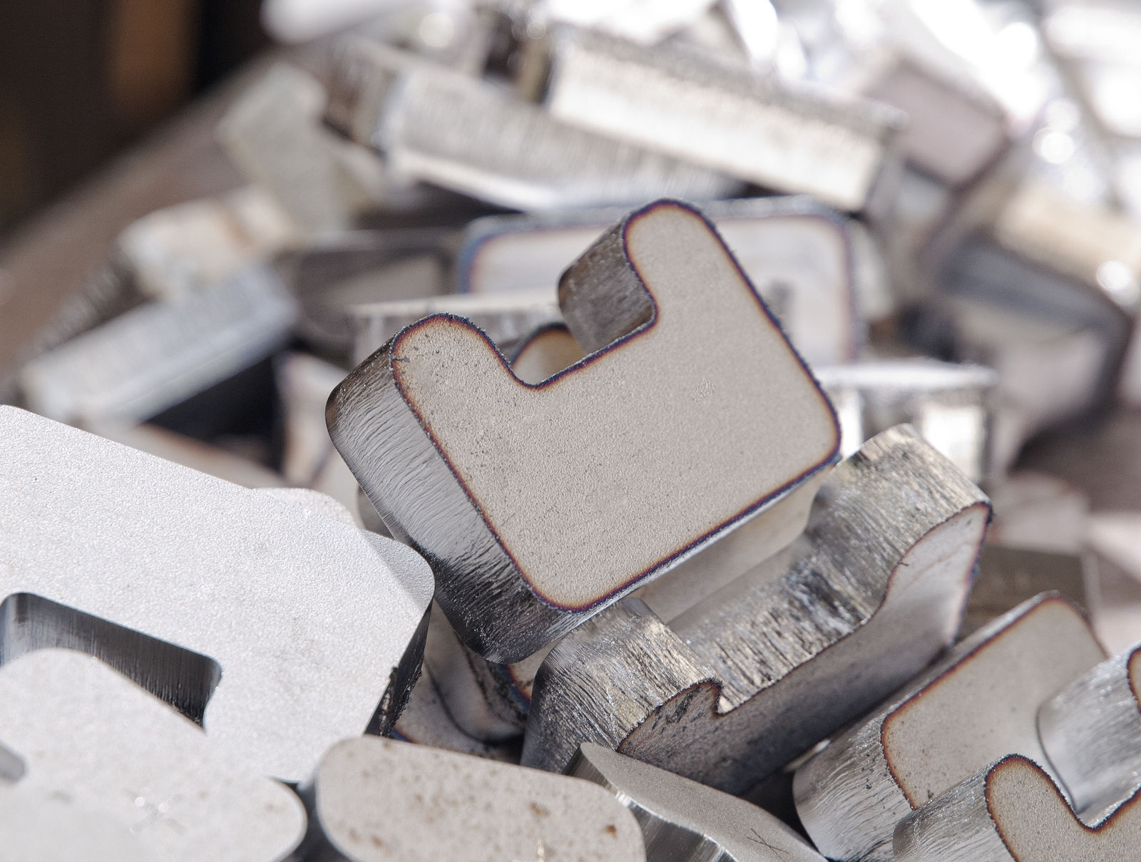 Pile of laser cut steel parts