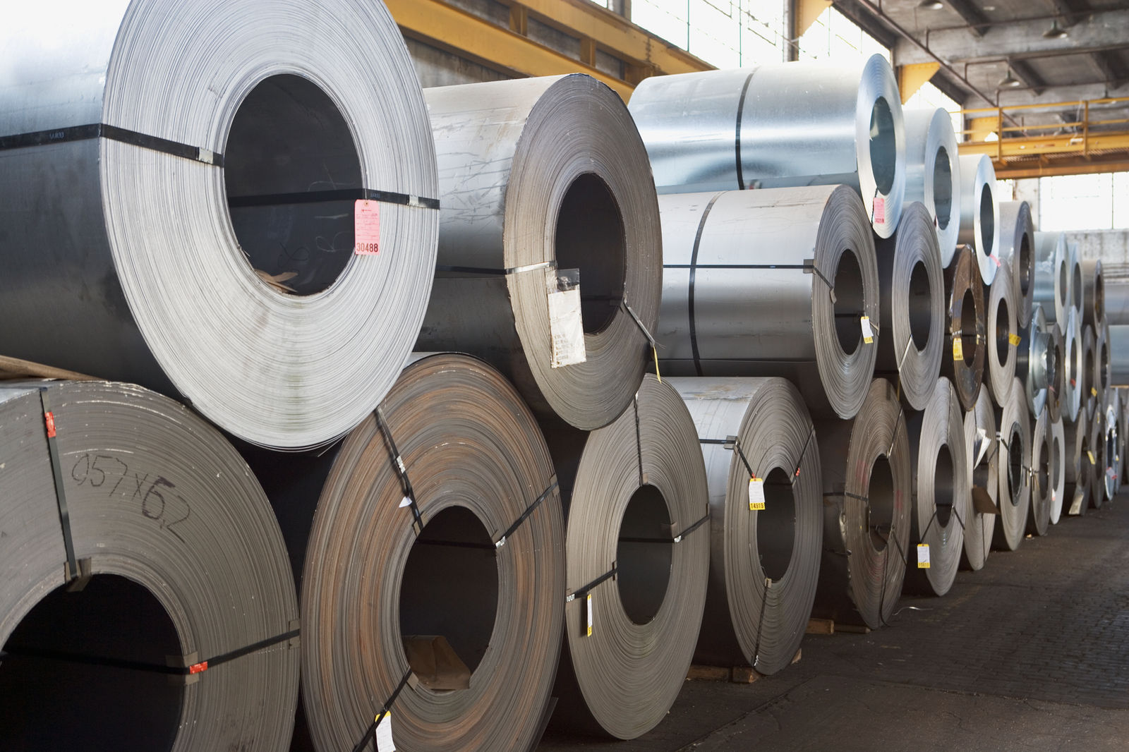 Coils of sheet steel in a warehouse
