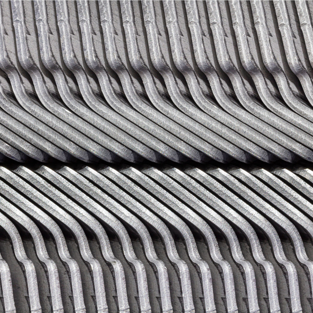 Rows of bent metal bars