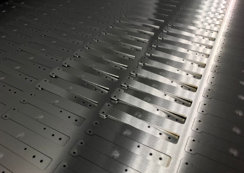 Sheet of laser cut stainless steel parts